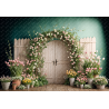 A Wooden Door Framed By A Beautiful Floral Arch  Surrounded By Potted